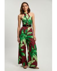Karen Millen - Viscose Linen Palm Tree Belted Halterneck Woven Jumpsuit - Lyst