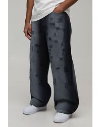 BoohooMAN - Fade Wash Extreme Distressed Baggy Fit Jeans - Lyst