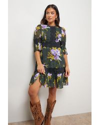 Oasis - Petite Printed Lace Trim Pleated Mini Dress - Lyst