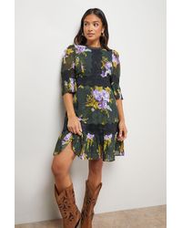 Oasis - Petite Printed Lace Trim Pleated Mini Dress - Lyst