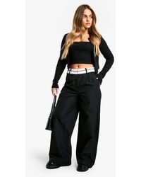 Boohoo - Petite Reverse Waistband Tailored Wide Leg Trousers - Lyst