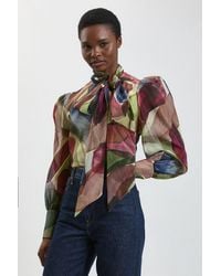 Karen Millen - Petal Print Organza Pussybow Blouse - Lyst