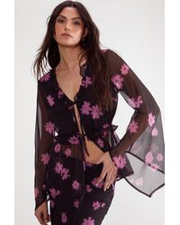 Nasty Gal - Ditsy Chiffon Ruffle Tie Front Fluted Sleeve Top - Lyst