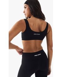 DSGN Studio - Sport Zip Front Light Support Padded Sports Bra - Lyst
