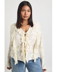 Boohoo - Plus Burnout Double Ruffle Tie Front Blouse - Lyst