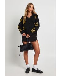 Boohoo - Star Tinsel Print Oversized Knitted Cardigan - Lyst