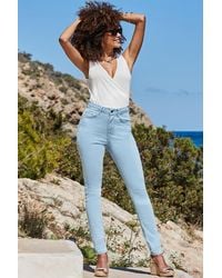 Sosandar - Light Wash Skinny Jeans - Lyst