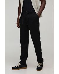 BoohooMAN - Tapered Fit Half & Waistband Textured Trouser - Lyst