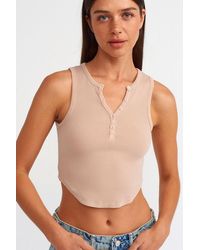Dilvin - Vrouwen Geribbelde Cropped Blouse Met Knopen - Lyst
