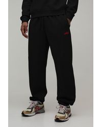 BoohooMAN - Regular Fit Pintuck Embroidered Cuffed Jogger - Lyst