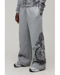 BoohooMAN - Extreme Wide Leg Dragon Graphic Joggers - Lyst