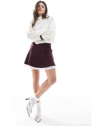 Miss Selfridge - Flippy Mini Skirt With Bows - Lyst