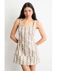 Warehouse - Snake Print Faux Leather Mini Dress - Lyst