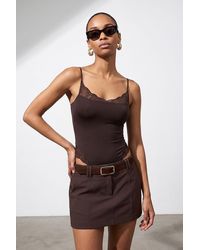 Dilvin - Lace Sleeveless Slim-Fit Bodysuit Blouse - Lyst