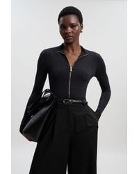 Karen Millen - Contour Jersey High Neck Zip Detail Long Sleeve Bodysuit - Lyst