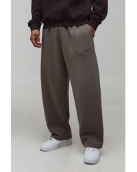 BoohooMAN - Balloon Fit Embroidered Washed Jogger - Lyst