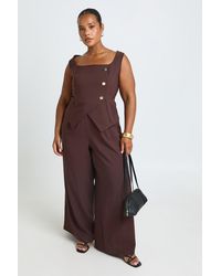 Boohoo - Plus Crepe Button Wrap Front Jumpsuit - Lyst