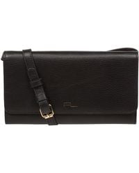 Pure Luxuries - 'Saffron' Nappa Leather Cross Body Clutch Bag - Lyst