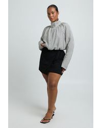 Boohoo - Plus Textured Wrap Waist Mini Skirt - Lyst