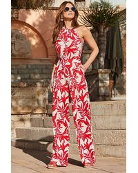 Sosandar - Tropical Print Halter Neck Jumpsuit With Pockets - Lyst