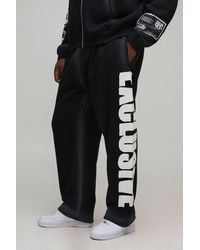 BoohooMAN - Plus Baggy Moto Applique Spray Wash Jogger - Lyst