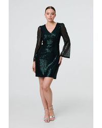 Izabel London - Sequin Semi Sheer Long Sleeve Mini Dress - Lyst