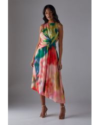 Warehouse - Printed Satin Sleeveless Knot Front Asymmetric Hem Midi Dress - Lyst
