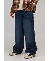 BoohooMAN - Baggy Fit Studded Western Embroidered Hem Jeans - Lyst