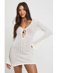 Boohoo - Key Hole Tie Long Sleeve Crochet Mini Beach Dress - Lyst