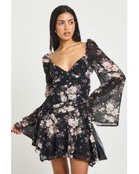 Boohoo - Floral Ruched Sweetheart Pleated Skater Dress - Lyst
