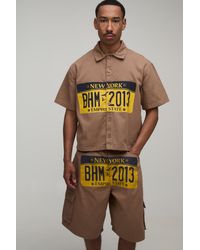 BoohooMAN - Washed Twill License Plate Graphic Oversized Boxy Shirt & Longline Parachute Short Set - Lyst