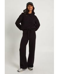 Boohoo - Petite Super Soft Crew Neck Knitted Chunky Cardigan And Wide Leg Trouser Co-Ord - Lyst