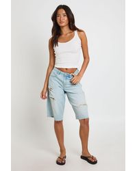 Boohoo - Mid Waist Ripped Denim Jorts - Lyst