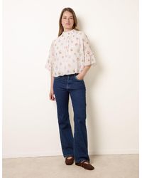 Blue Vanilla - High Neck Frill Sleeve Dobby Floral Print Puffball Blouse - Lyst