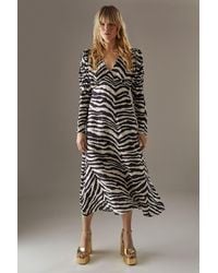 Warehouse - Zebra Viscose V Neck Long Puff Sleeve Midi Dress - Lyst