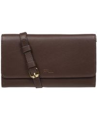 Pure Luxuries - 'Saffron' Hot Fudge Nappa Leather Cross Body Clutch Bag - Lyst