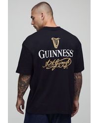 BoohooMAN - Oversized Extended Neck Guinness License Printed T-Shirt - Lyst