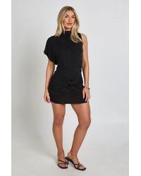 Boohoo - Acetate Slinky One Sleeve Knot Front Mini Dress - Lyst