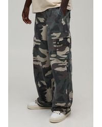 BoohooMAN - Baggy Fit Camo Print Twill Trousers - Lyst