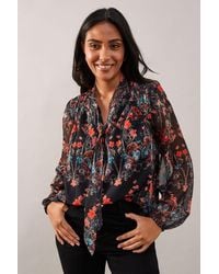 Wallis - Petite Floral Border Print Tie Neck Top - Lyst