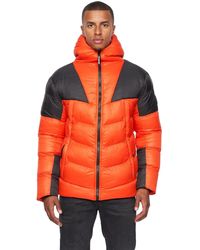 Duck and Cover - Raymax Contrast Paneel Gewatteerde Jas (oranje/zwart) - Lyst