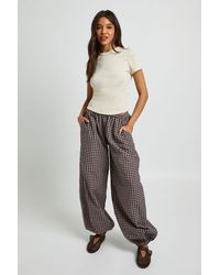 Boohoo - Elasticated Waist Check Balloon Trousers - Lyst