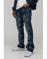 BoohooMAN - Stacked Flared Cross Rhinestone Embellished Denim Jeans - Lyst