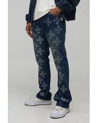 BoohooMAN - Stacked Flared Cross Rhinestone Embellished Denim Jeans - Lyst