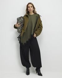 River Island - T-Shirt Asymmetric Lace Satin - Lyst