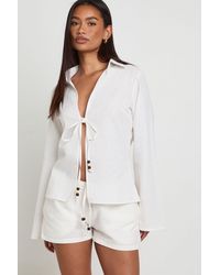 Boohoo - Linen Look Beaded Tie Front Top - Lyst