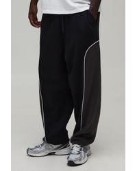 BoohooMAN - Baggy Fit Panelled Cuffed Jogger - Lyst