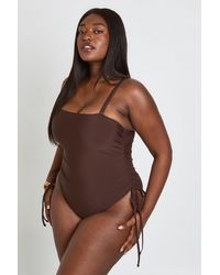 Boohoo - Plus Tummy Control Ruched Side Swimsuit - Lyst