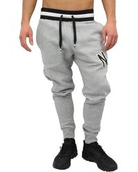 Nike - Air Sportswear Fleece Joggers In Grijs - Lyst
