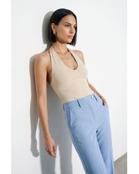 Dilvin - Halter Neck Cut-Out Bodysuit - Lyst